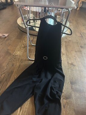 Sleeveless Black Jumpsuit with Decorative Waist Accent